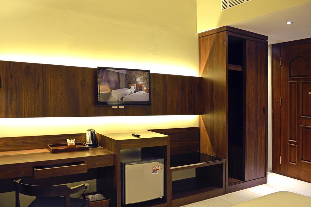 Hotel Safira Magelang Rum bild